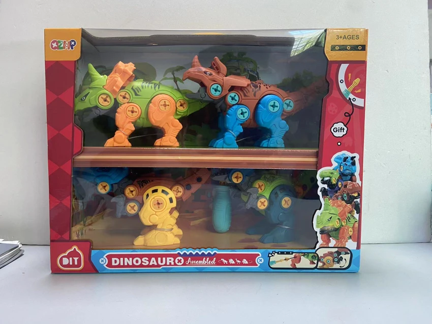 Four large assembly-line mechanical dogs