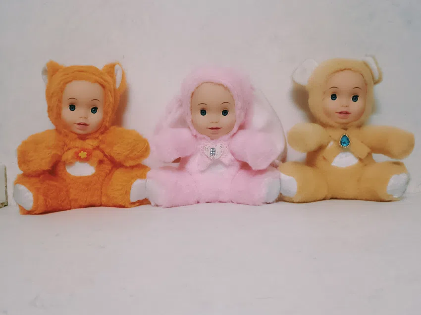 20cm plush with vinyl head and cotton-filled body