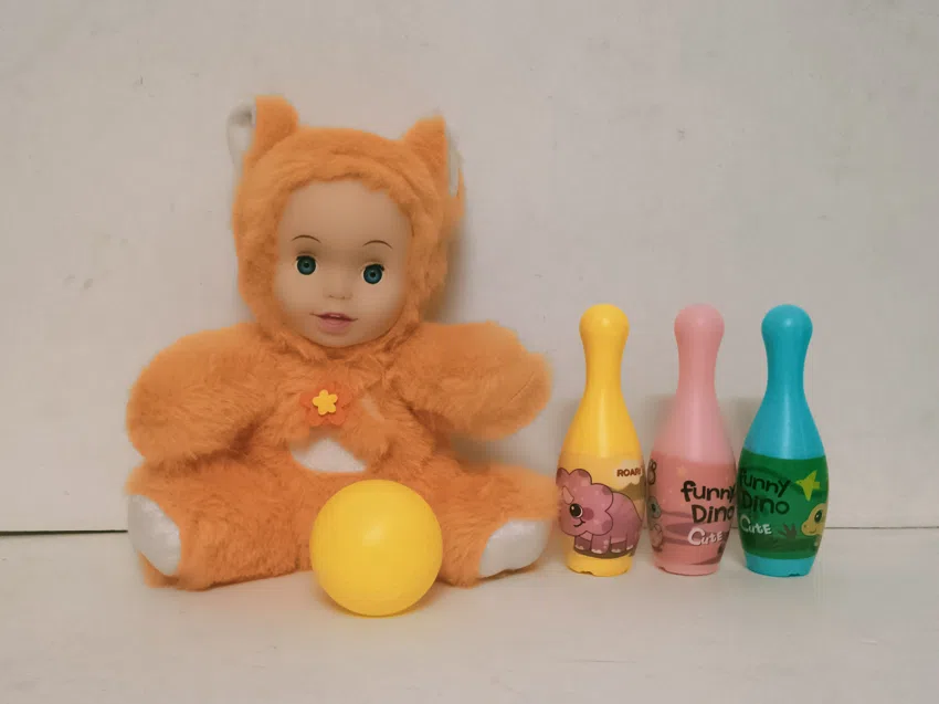 20cm plush with vinyl head and cotton-filled body with bowling ball