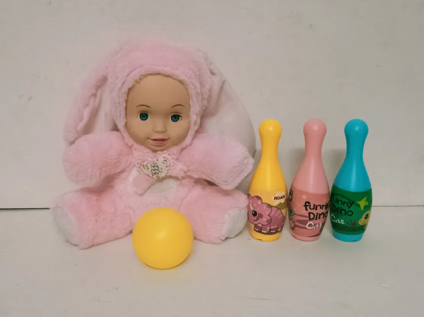 20cm plush with vinyl head and cotton-filled body with bowling ball