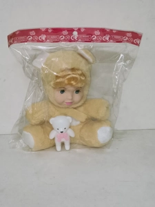 20cm plush with vinyl head and cotton-filled body with bear