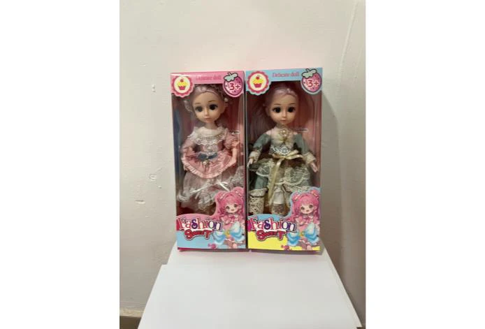 12 fashion Barbie dolls