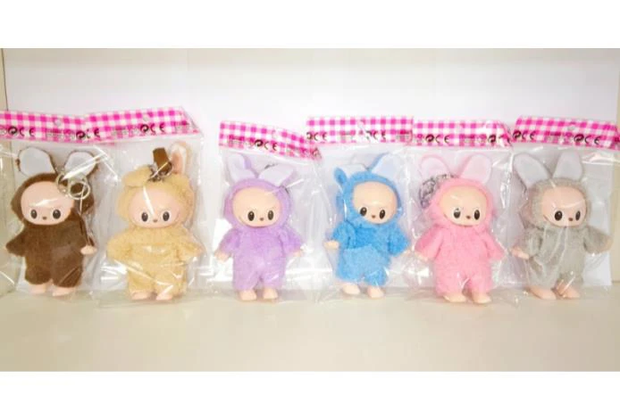 Rubber doll drawstring bag keychain