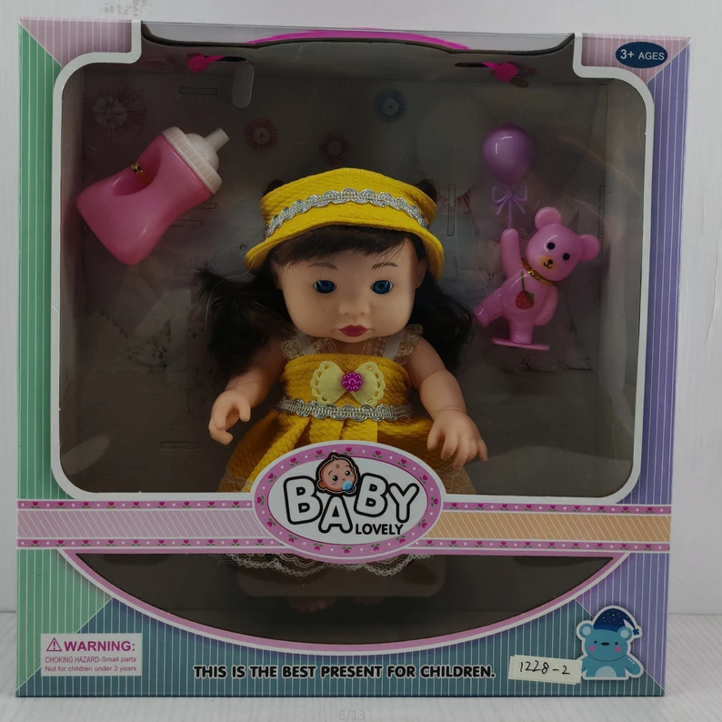 12-inch vinyl chubby doll with music, bottle, bear