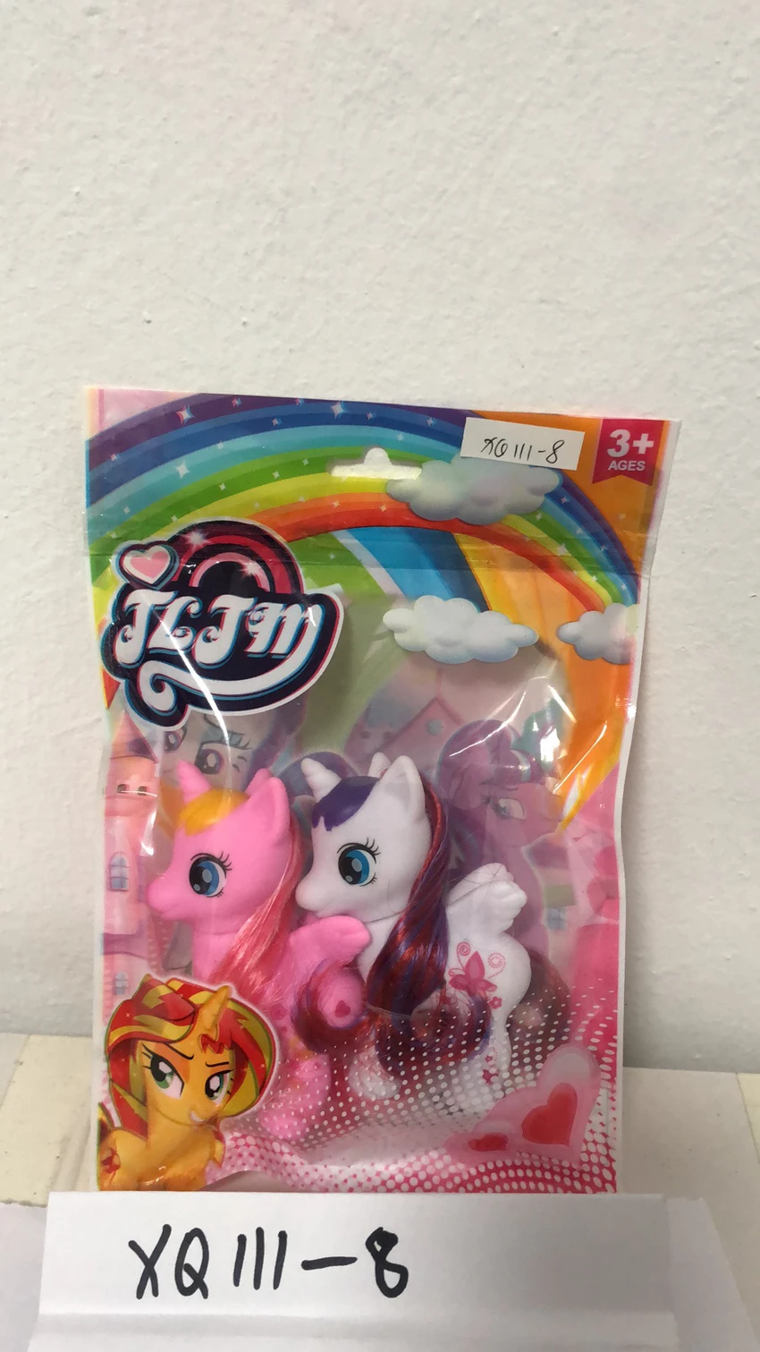 2 small horned horses