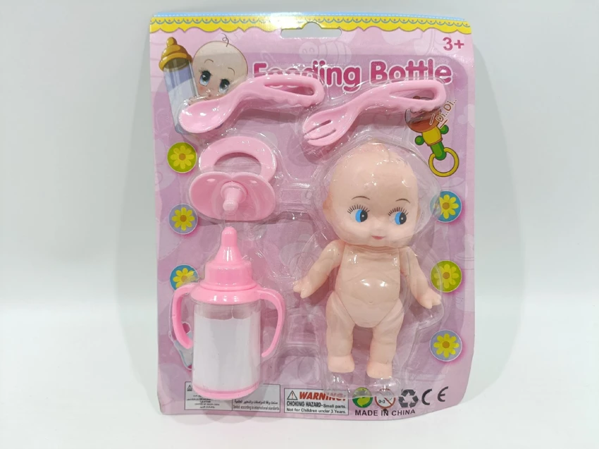 Doll with feeding bottle